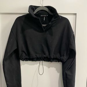 Cropped sweater top with drawstring